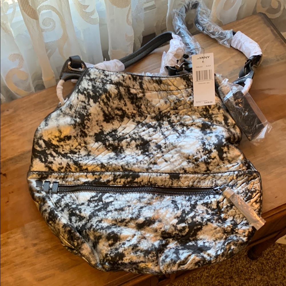 Brand new leather OrYany purse! Protective handle wrap still intact!